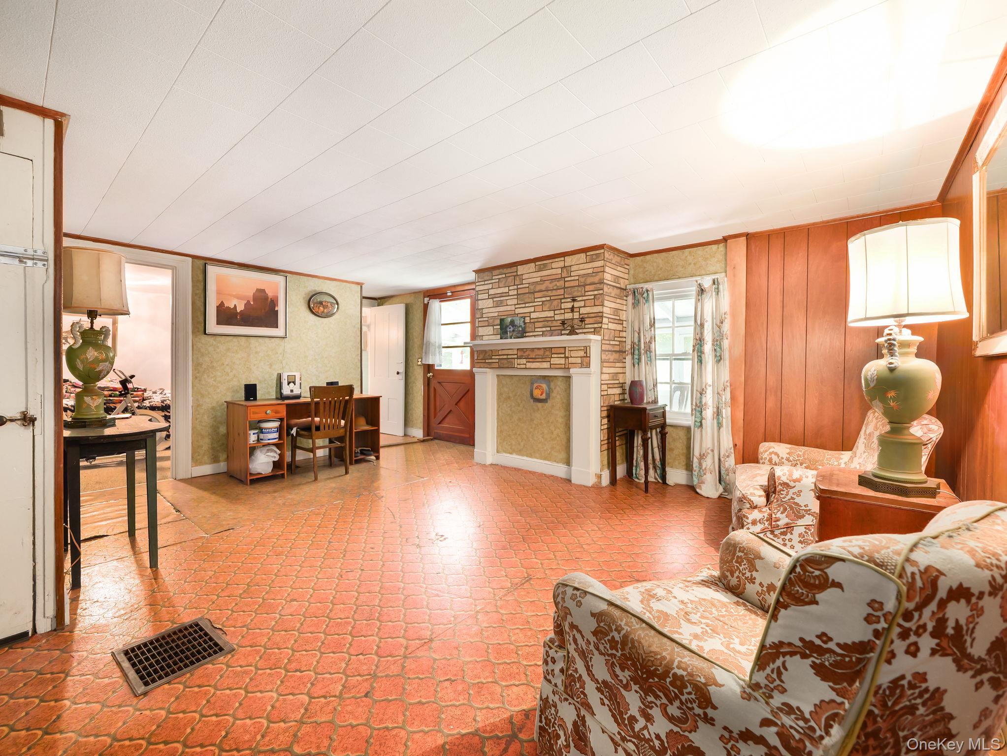 19 Oakland Valley Road Cuddebackville, NY 12729 - Photo 7 of 30 a living room with furniture and a wooden floor