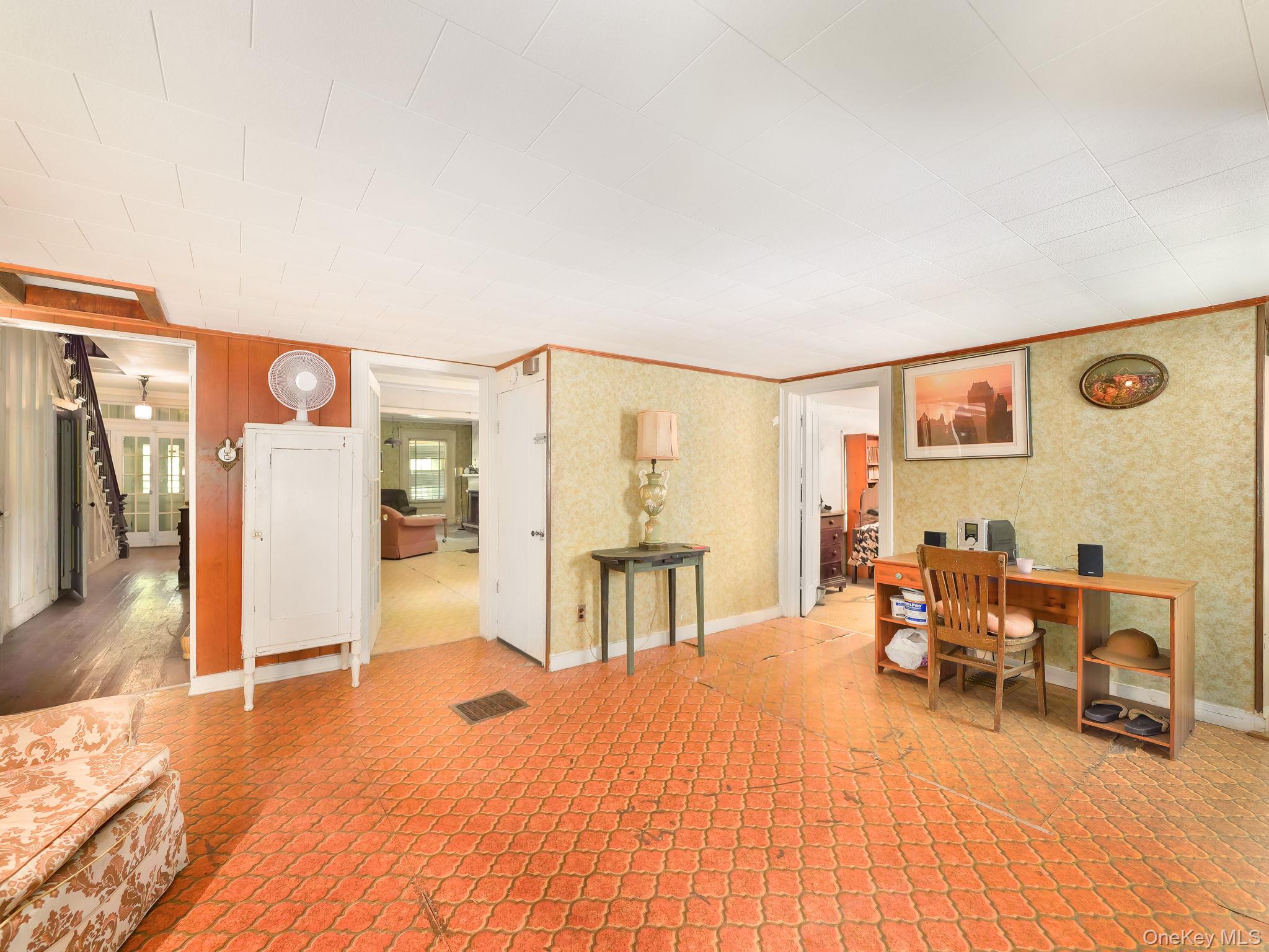 19 Oakland Valley Road Cuddebackville, NY 12729 - Photo 9 of 30 a living room with furniture pool table and a fireplace