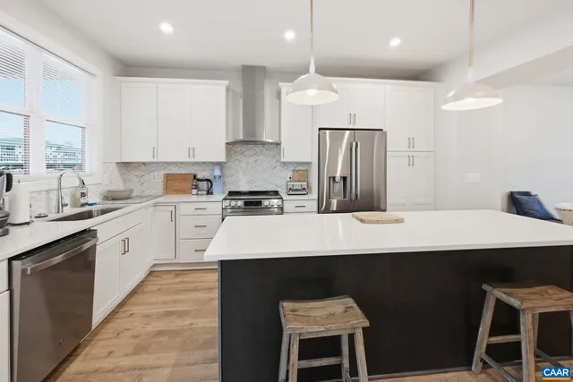 a kitchen with a sink and a window