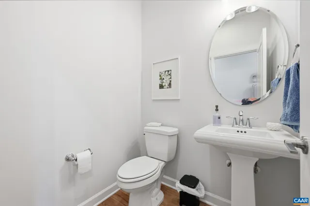 a utility room with sink dryer and washer