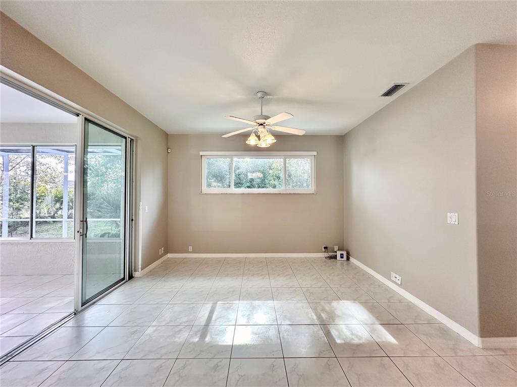 16 Westbrook Lane Palm Coast, FL 32164 - Photo 16 of 42 a view of an empty room with a window