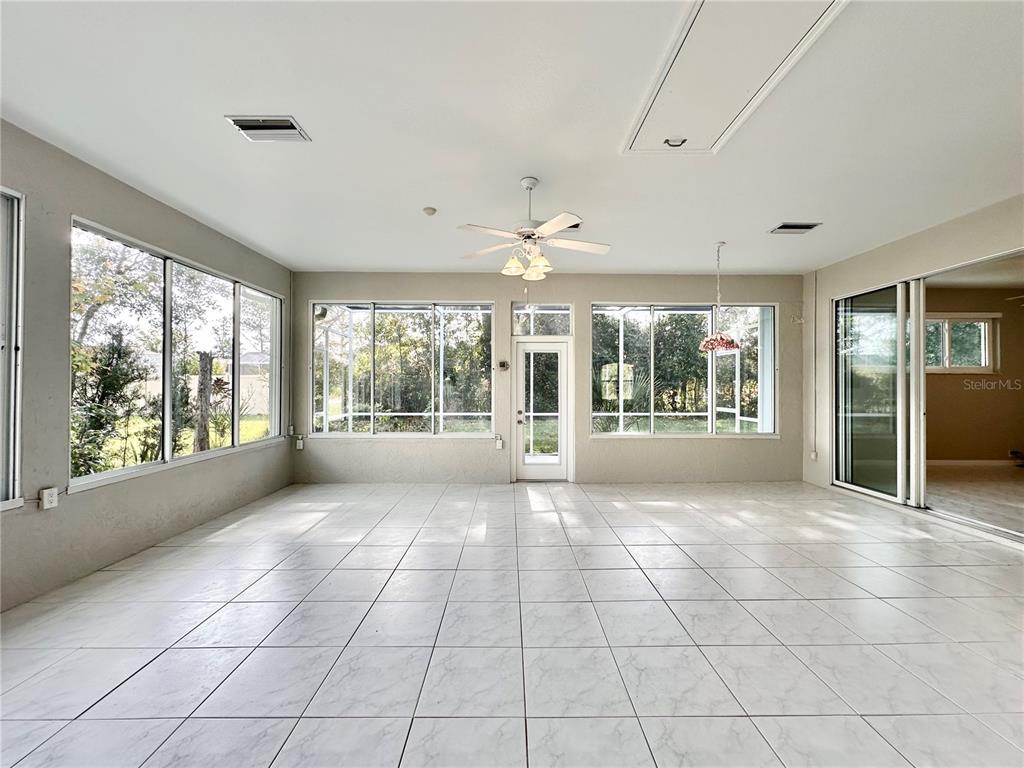 16 Westbrook Lane Palm Coast, FL 32164 - Photo 19 of 42 a view of an empty room with a window