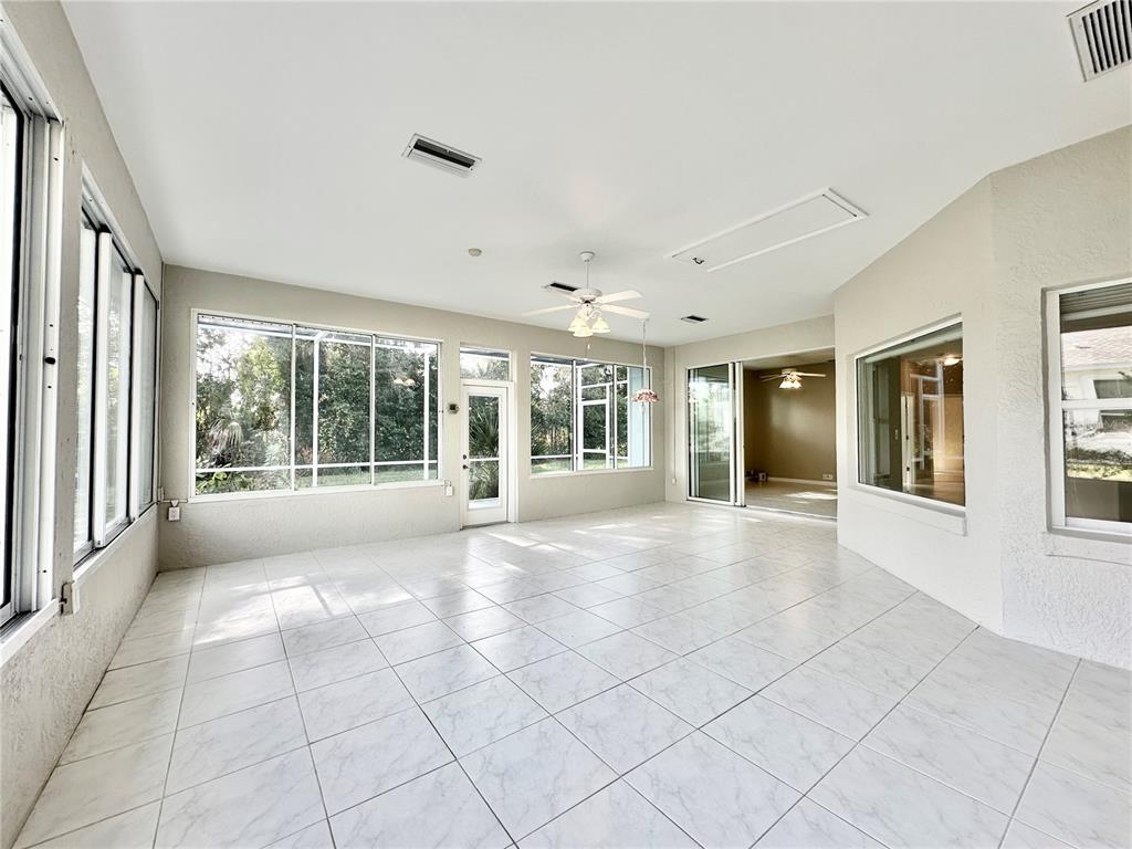 16 Westbrook Lane Palm Coast, FL 32164 - Photo 20 of 42 a view of an empty room with windows