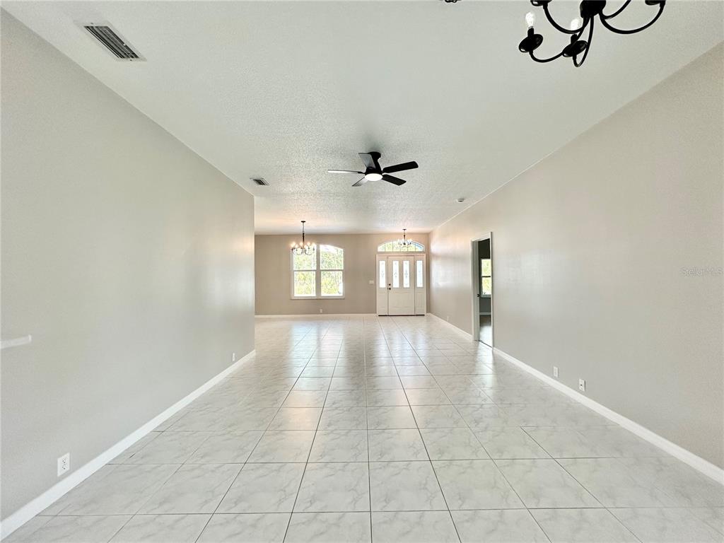 16 Westbrook Lane Palm Coast, FL 32164 - Photo 4 of 42 a view of an empty room with a window