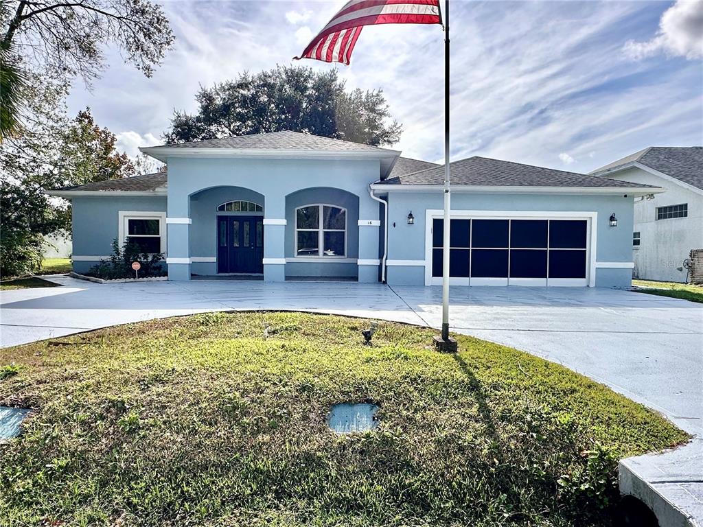 16 Westbrook Lane Palm Coast, FL 32164 - Photo 41 of 42 a house view with a outdoor space