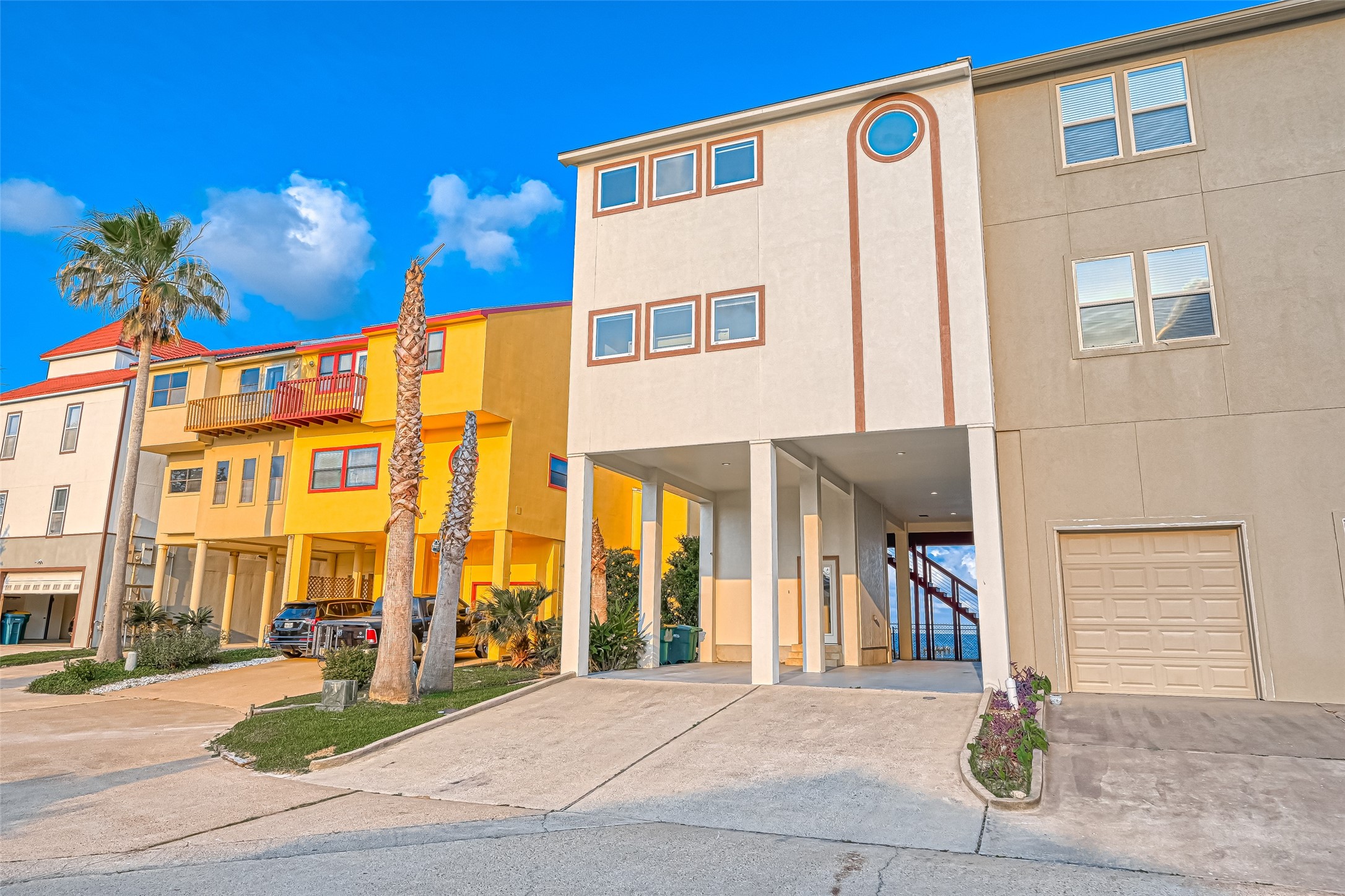 2102 Todville Road, Unit 9 Seabrook, TX 77586 - Photo 2 of 34 a front view of a building with street