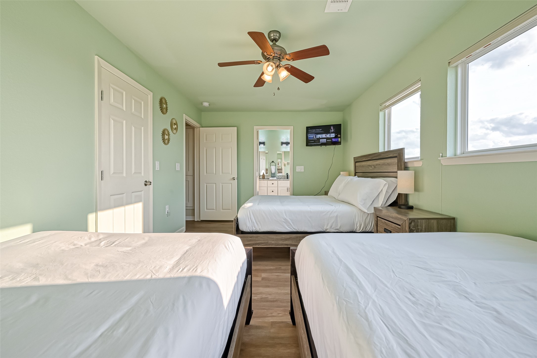 2102 Todville Road, Unit 9 Seabrook, TX 77586 - Photo 22 of 34 a bedroom with two beds and a window