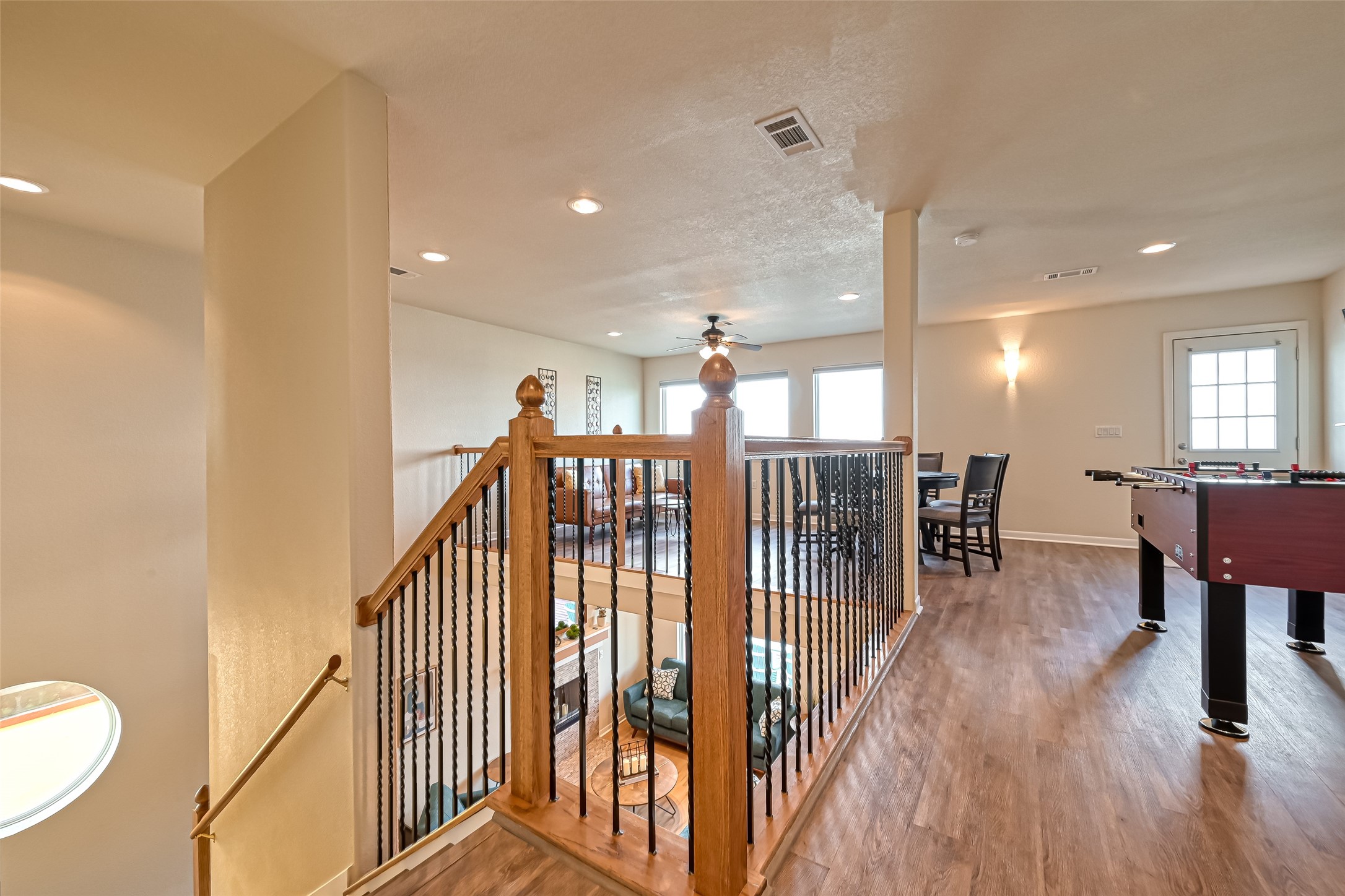 2102 Todville Road, Unit 9 Seabrook, TX 77586 - Photo 26 of 34 a view of a hallway with wooden floor and furniture