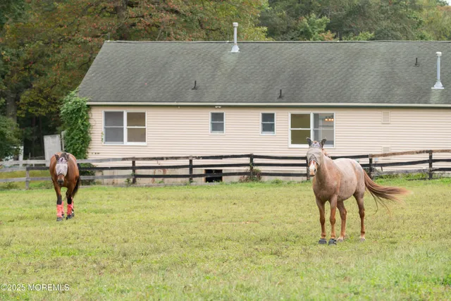a view of a house with swimming pool