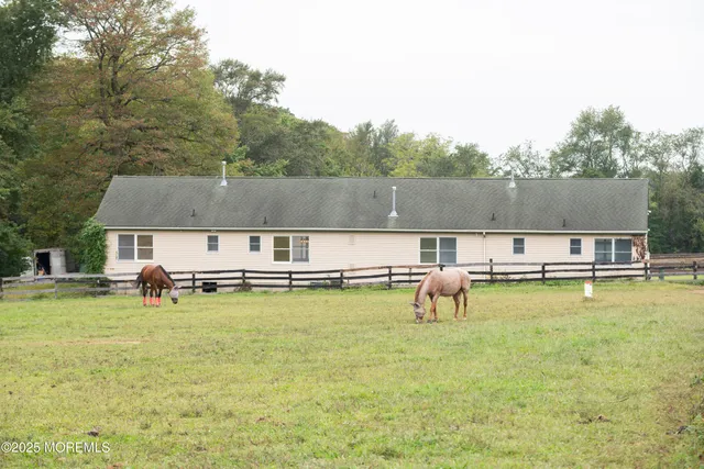 a view of a lake with houses with outdoor space
