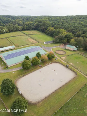 a view of a swimming pool with a yard