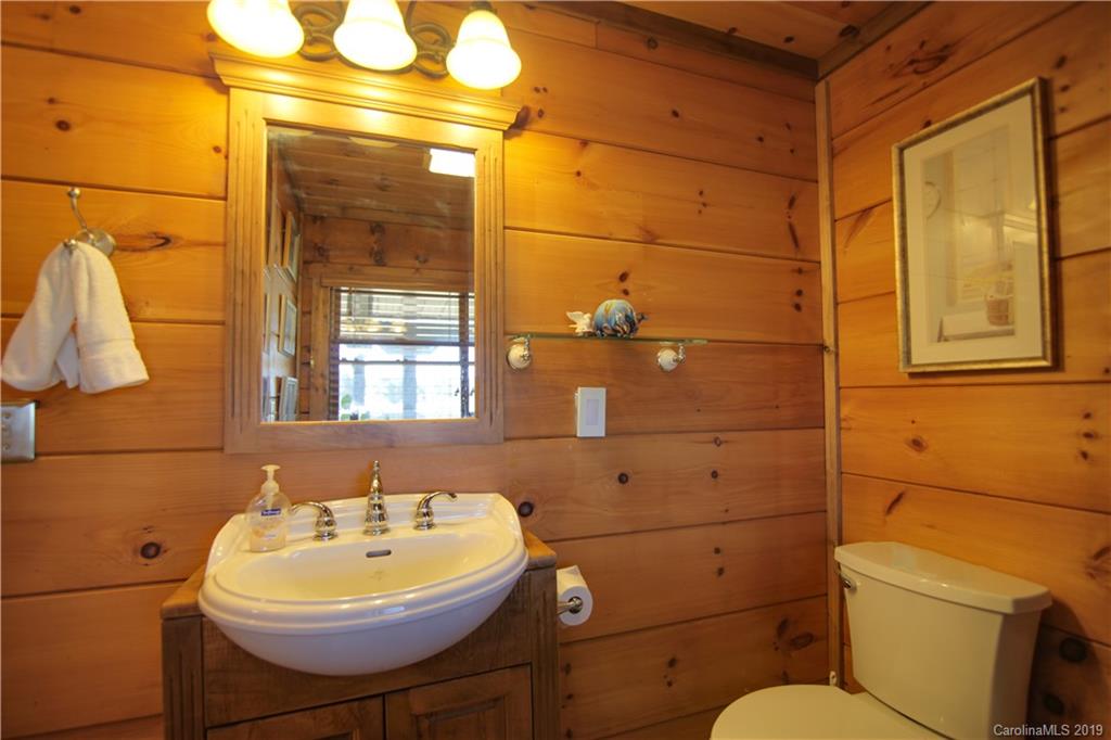 75 Stanley Dr Mill Spring Mill Spring, NC 28756 - Photo 17 of 48 a bathroom with a sink toilet and shower