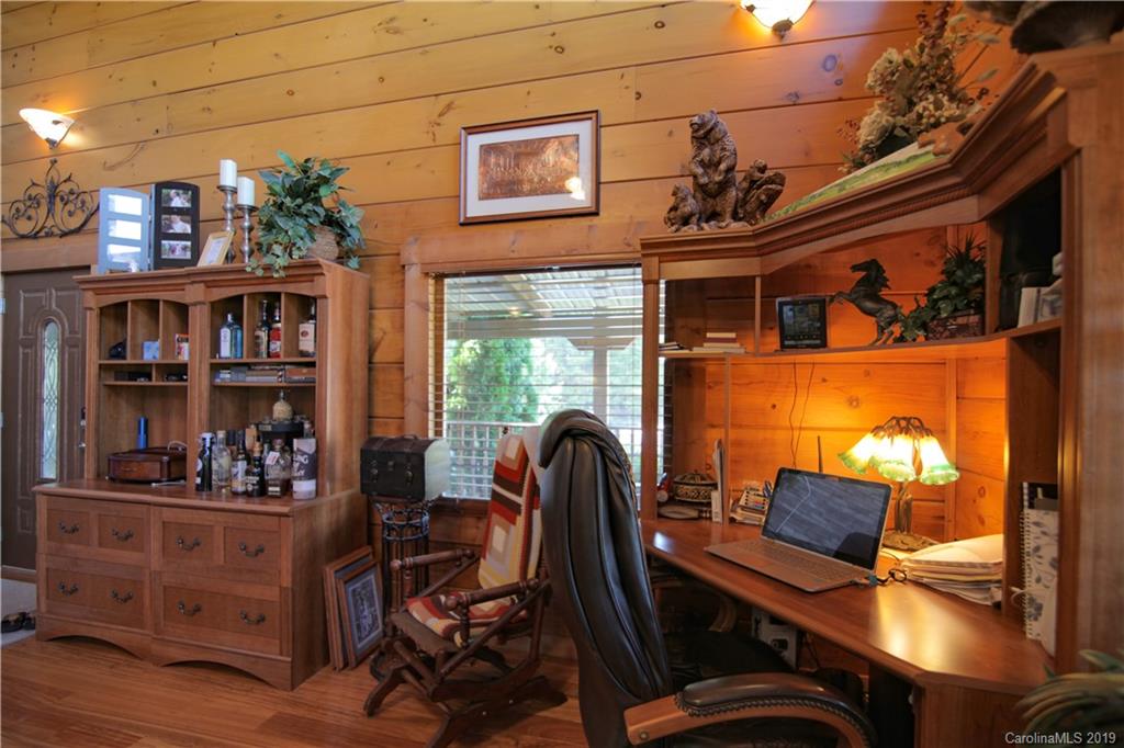 75 Stanley Dr Mill Spring Mill Spring, NC 28756 - Photo 7 of 48 a view of a workspace with furniture