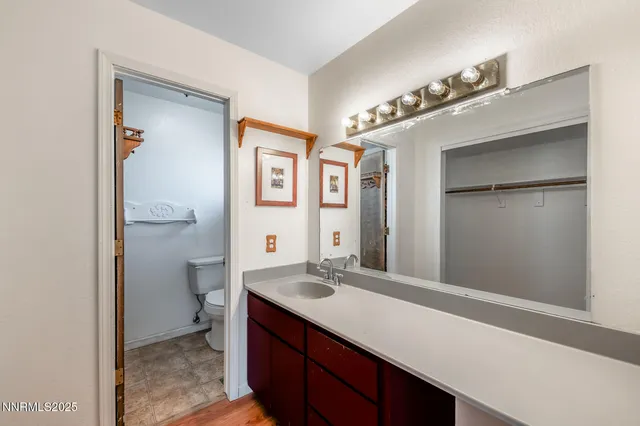 a bed room with a bed and a window