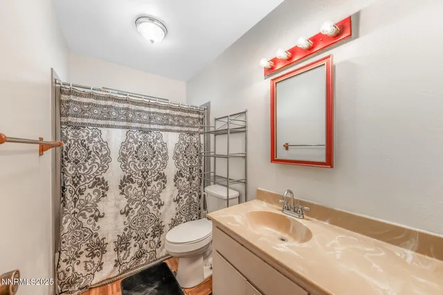a view of a storage & utility room with a washer dryer