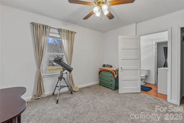 a view of a workspace with furniture