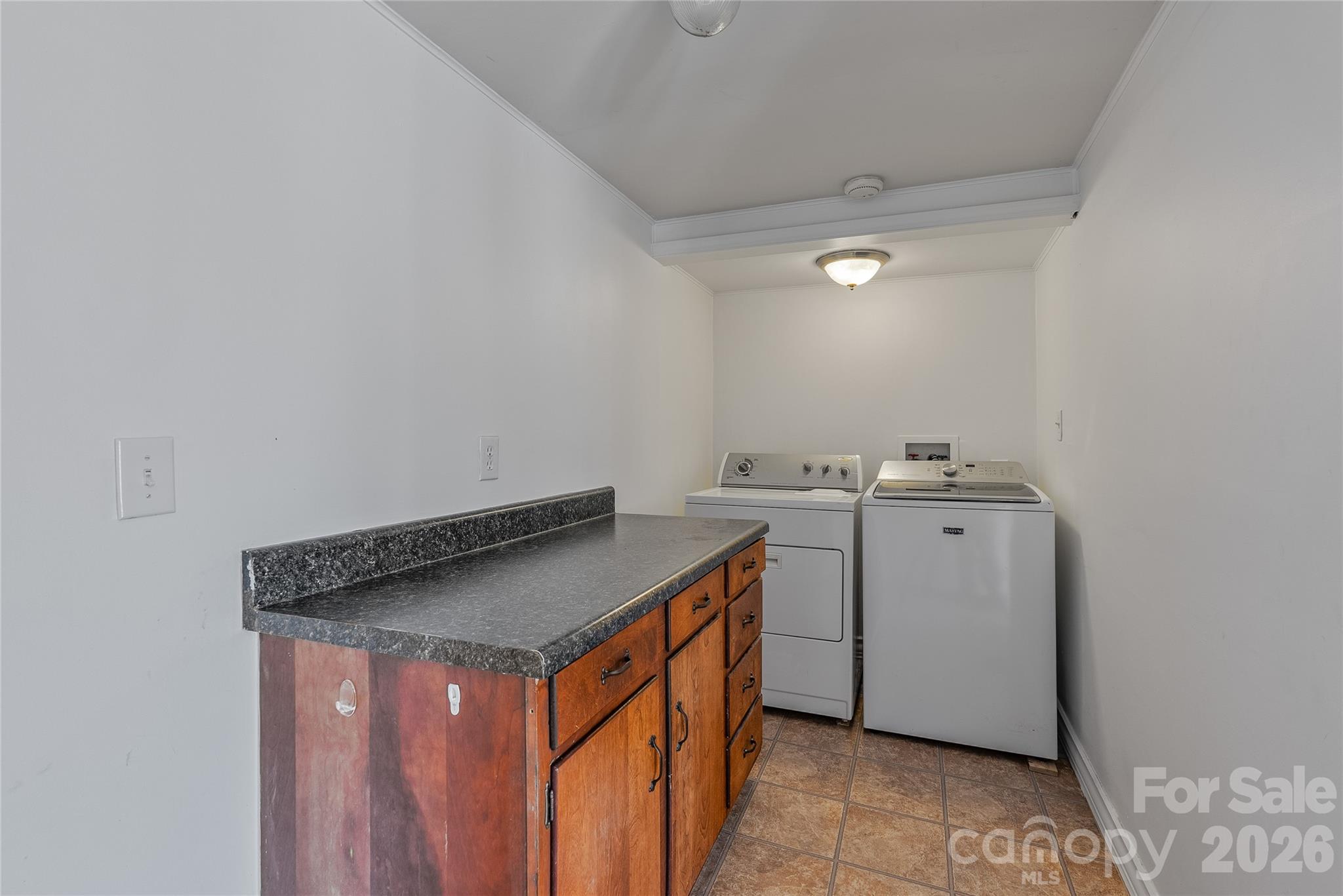 21 Ben Owenby Road Fairview, NC 28730 - Photo 24 of 38 a utility room with dryer and washer