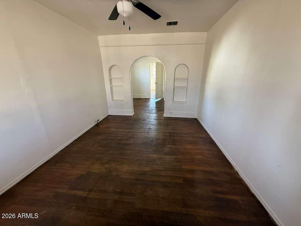 1315 C Avenue Douglas, AZ 85607 - Photo 2 of 10 a view of a hallway with wooden floor