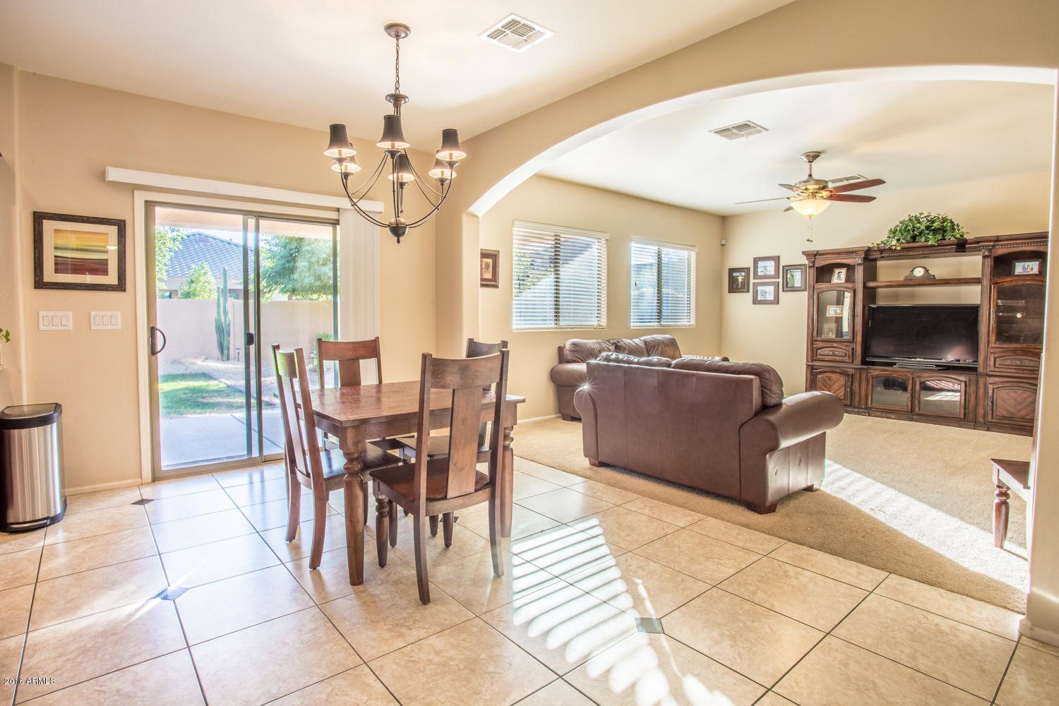 4313 East Folgers Road Phoenix, AZ 85050 - Photo 8 of 22 Living Room and Kitchen Sitting Area