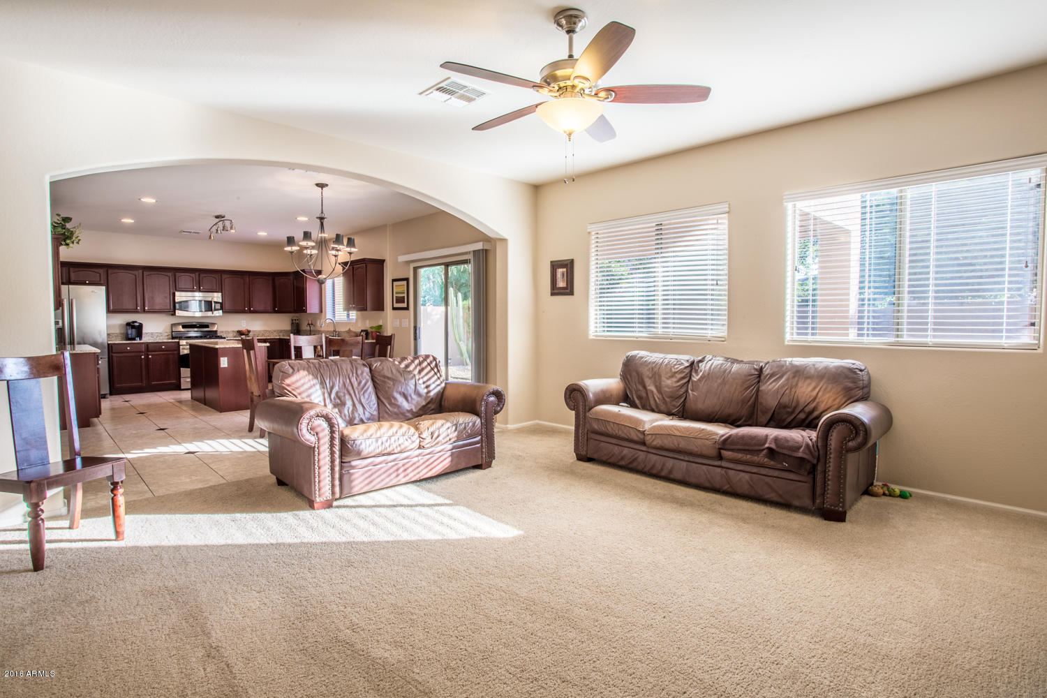 4313 East Folgers Road Phoenix, AZ 85050 - Photo 9 of 22 Living Room looking into Kitchen