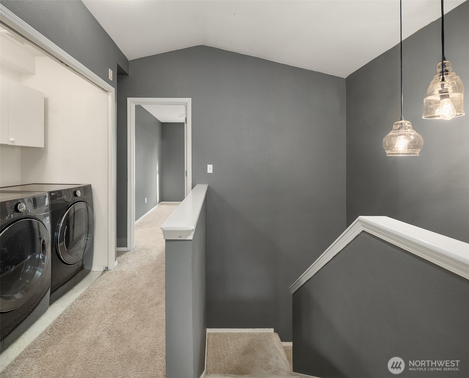 12113 Northeast 172nd Place, Unit J202 Bothell, WA 98011 - Photo 13 of 29 a utility room with dryer and washer