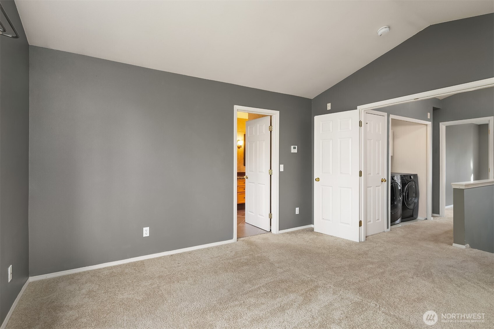12113 Northeast 172nd Place, Unit J202 Bothell, WA 98011 - Photo 16 of 29 a view of an empty room