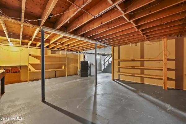 a view of backyard with small cabin