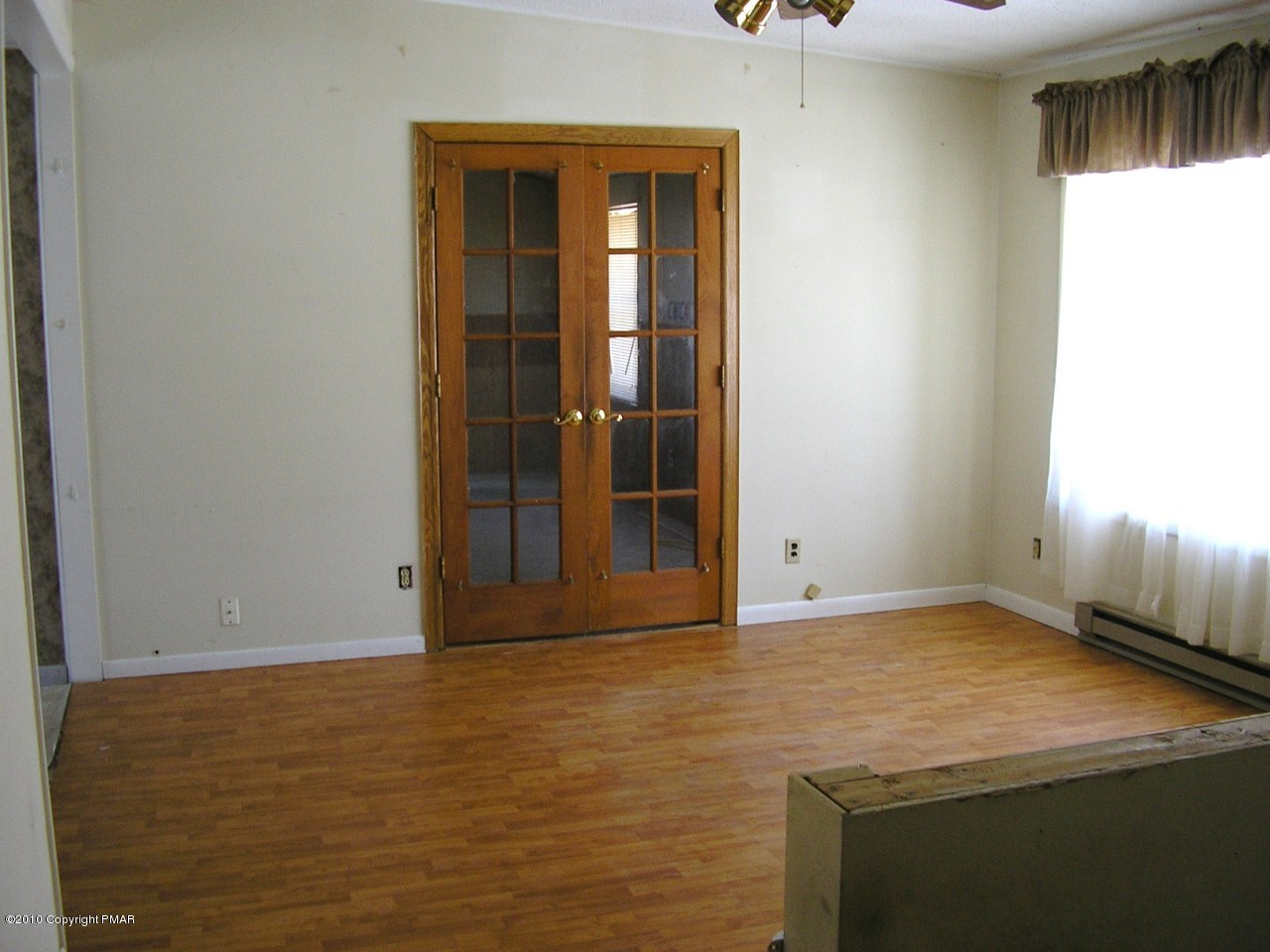 19 Edgewood Road Mount Pocono, PA 18344 - Photo 4 of 8 an empty room with window
