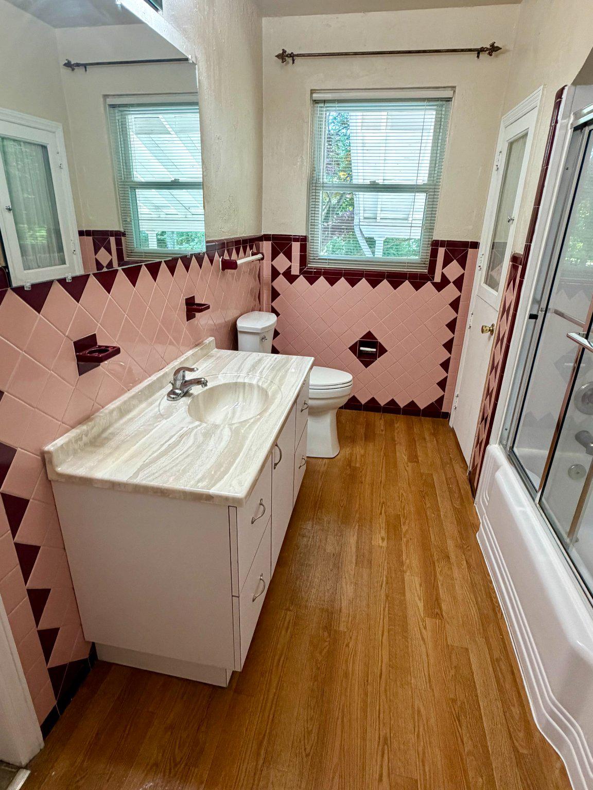 6318 Winner Avenue Baltimore, MD 21215 - Photo 31 of 75 a bath room with a sink furniture and a window