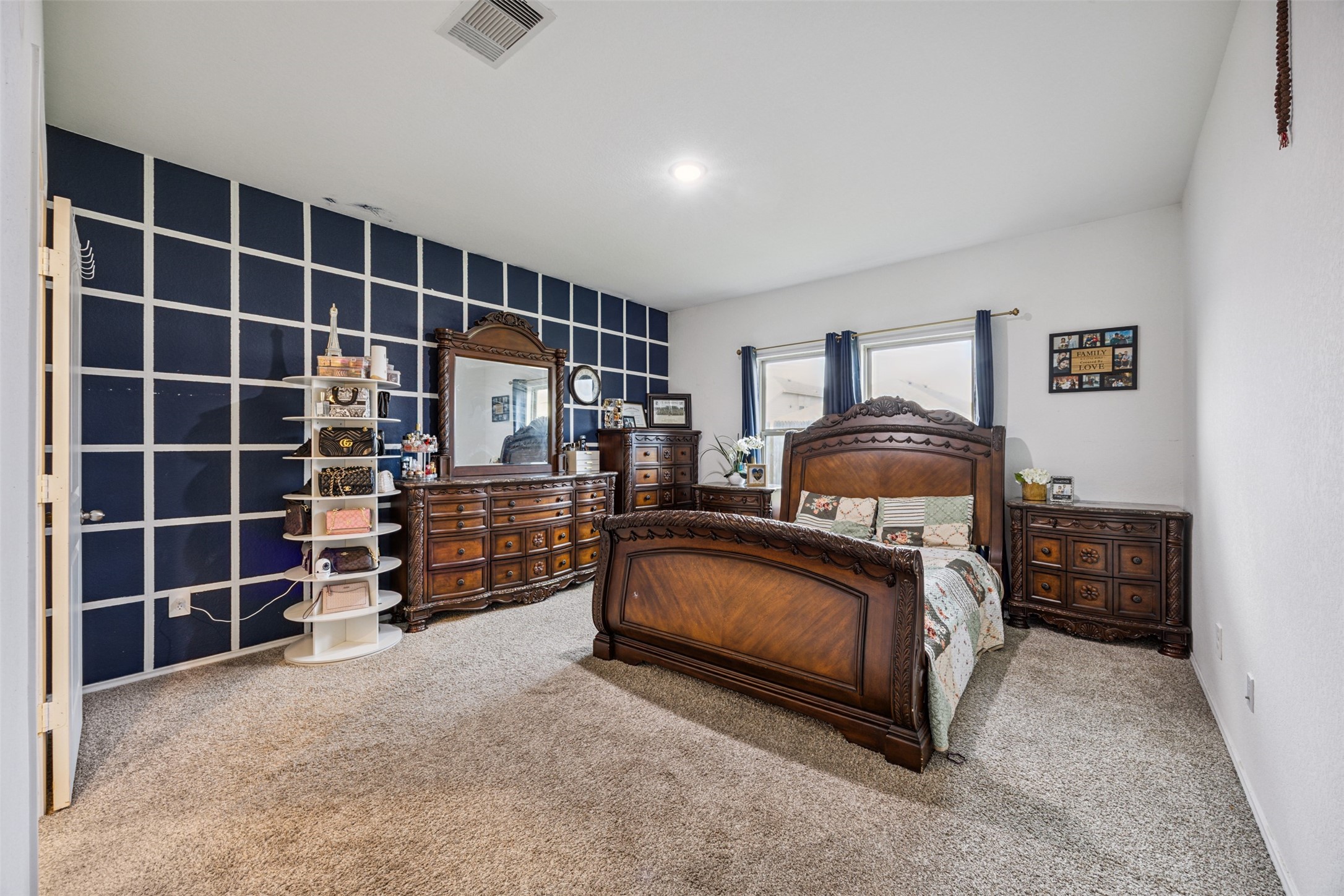 5102 Hedgerose Lane Katy, TX 77449 - Photo 14 of 31 a bedroom with furniture and walk in closet