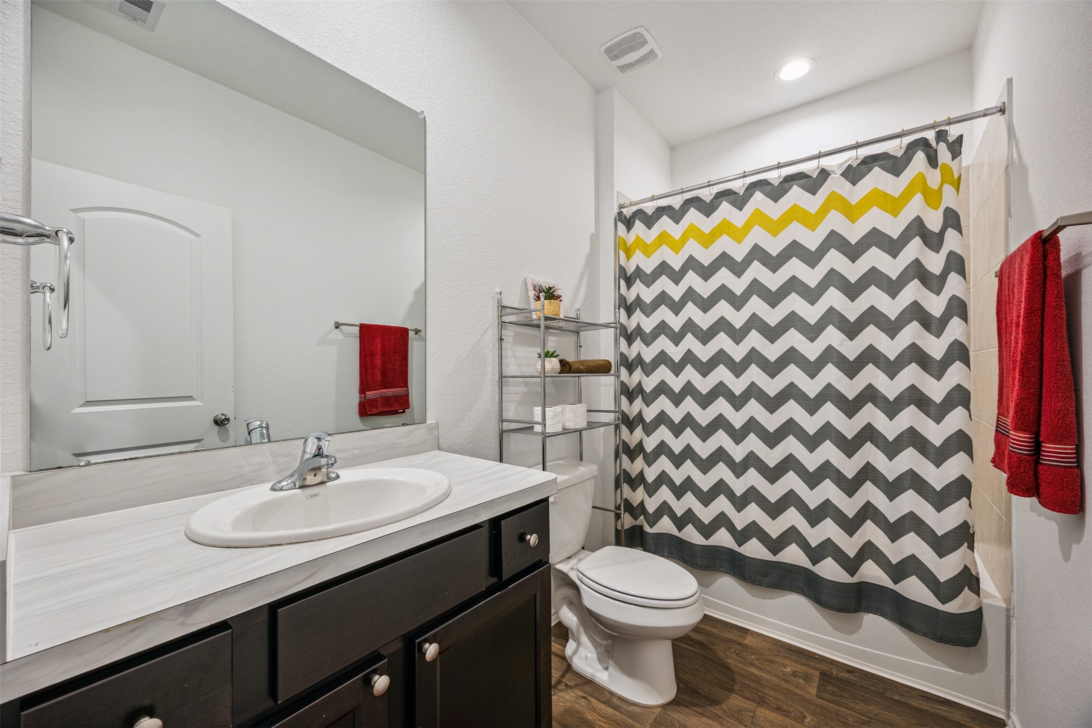 5102 Hedgerose Lane Katy, TX 77449 - Photo 19 of 31 a bathroom with a sink and a mirror