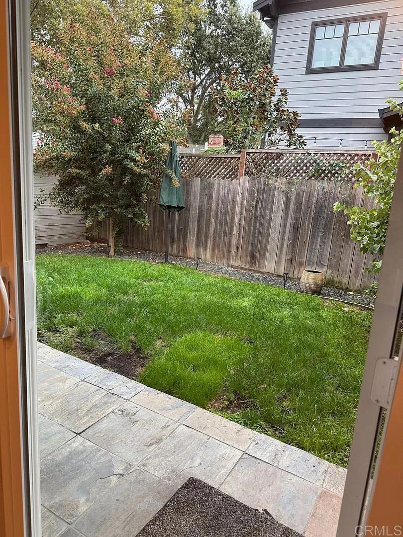 3615 Chestnut Street Lafayette, CA 94549 - Photo 4 of 11 a backyard of a house with lots of green space