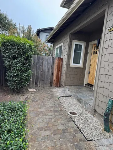 a view of a backyard of the house