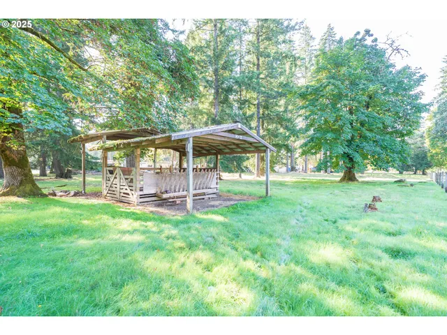 a view of outdoor space with deck and yard