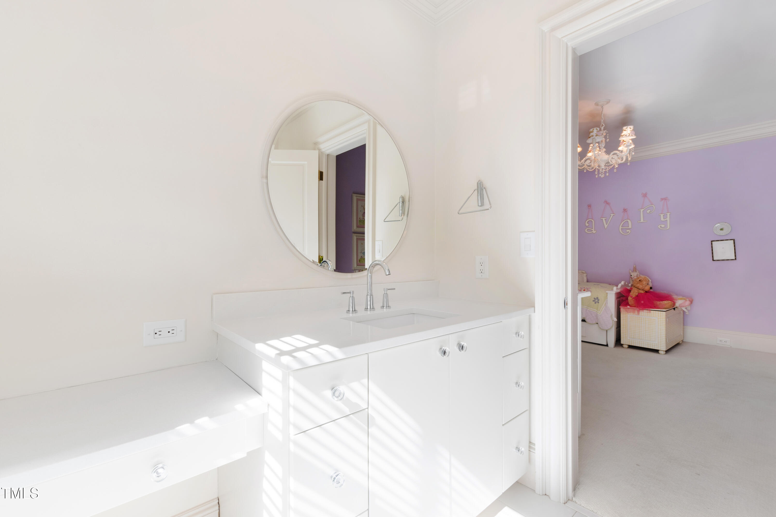 2658 Davis Street Raleigh, NC 27608 - Photo 68 of 99 a bathroom with a sink and a mirror