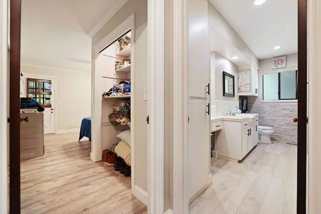 a view of living room kitchen and utility room