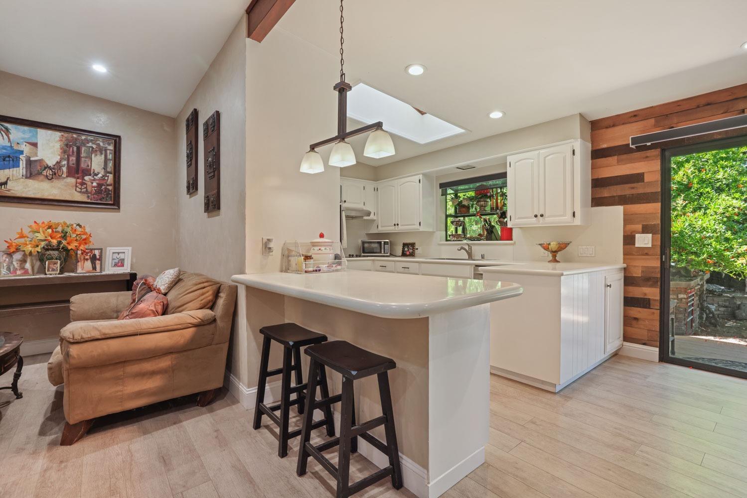 5348 Shippee Lane Stockton, CA 95212 - Photo 4 of 35 a kitchen with a sink cabinets and window
