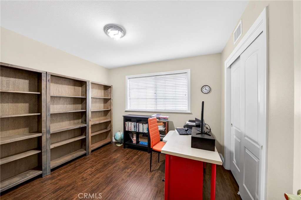 15243 Crosswood Road La Mirada, CA 90638 - Photo 16 of 44 a view of a workspace with furniture and wooden floor