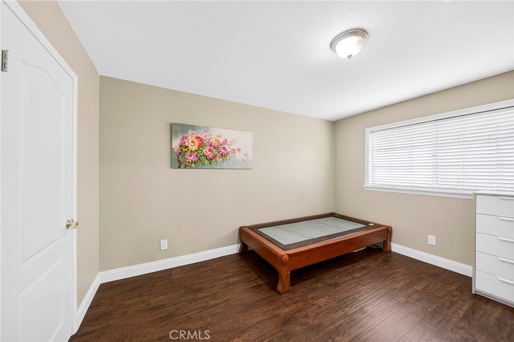 15243 Crosswood Road La Mirada, CA 90638 - Photo 18 of 44 a bench sitting in a room next to a window