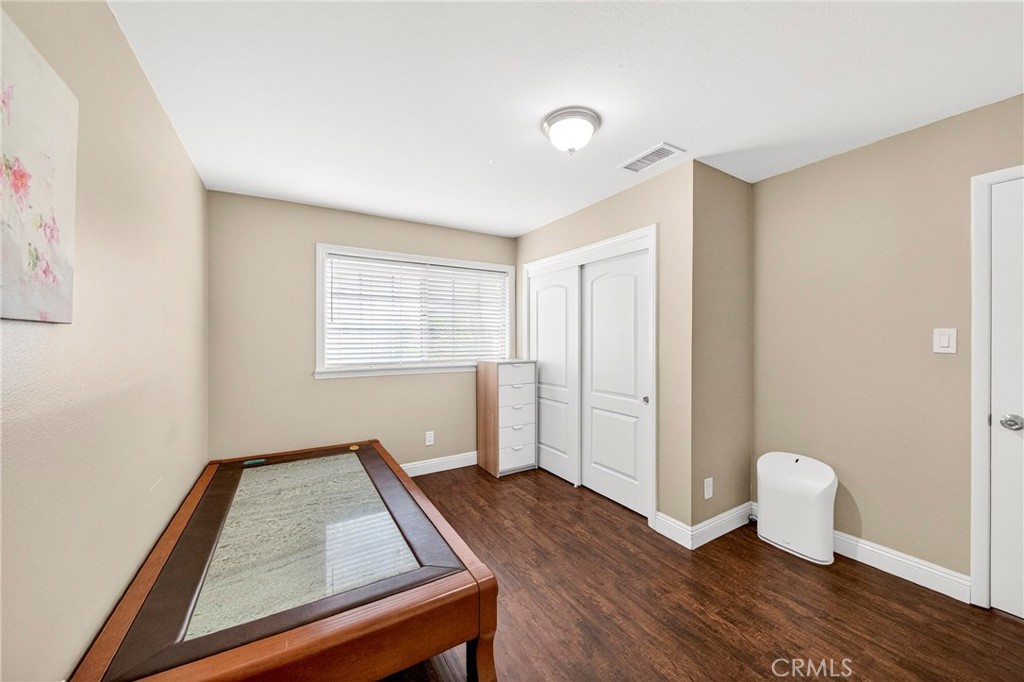 15243 Crosswood Road La Mirada, CA 90638 - Photo 19 of 44 a living room with a couch