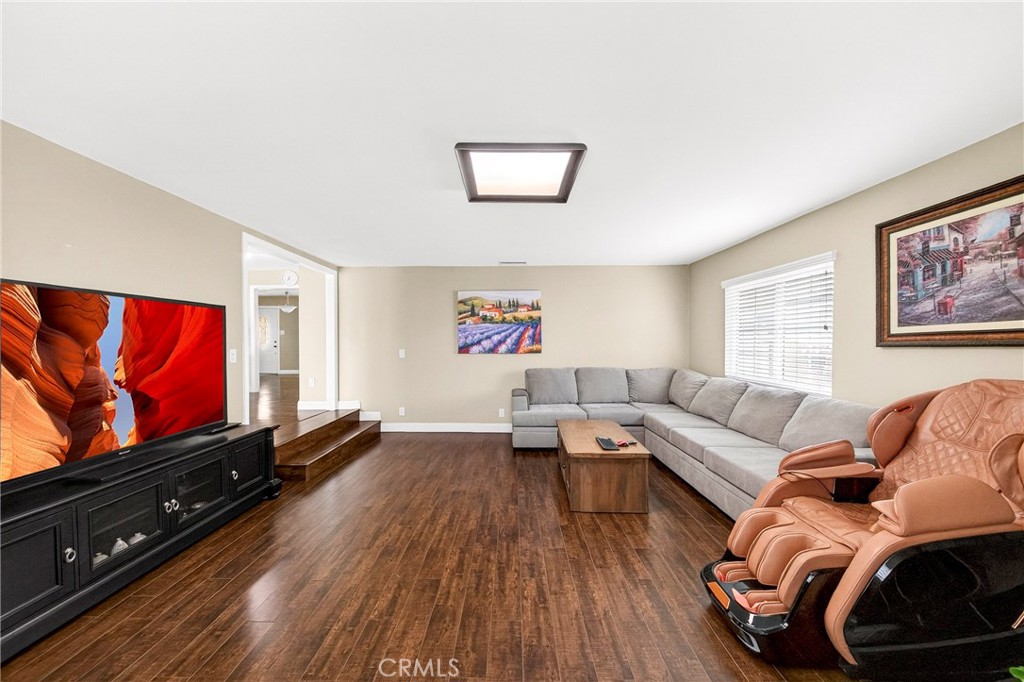 15243 Crosswood Road La Mirada, CA 90638 - Photo 38 of 44 a living room with furniture and a flat screen tv