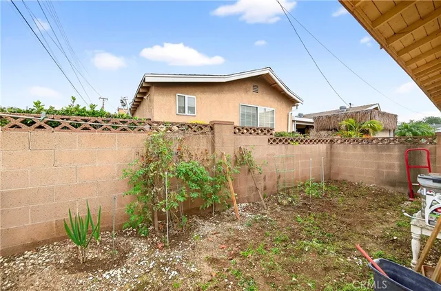 a house view with a garden space