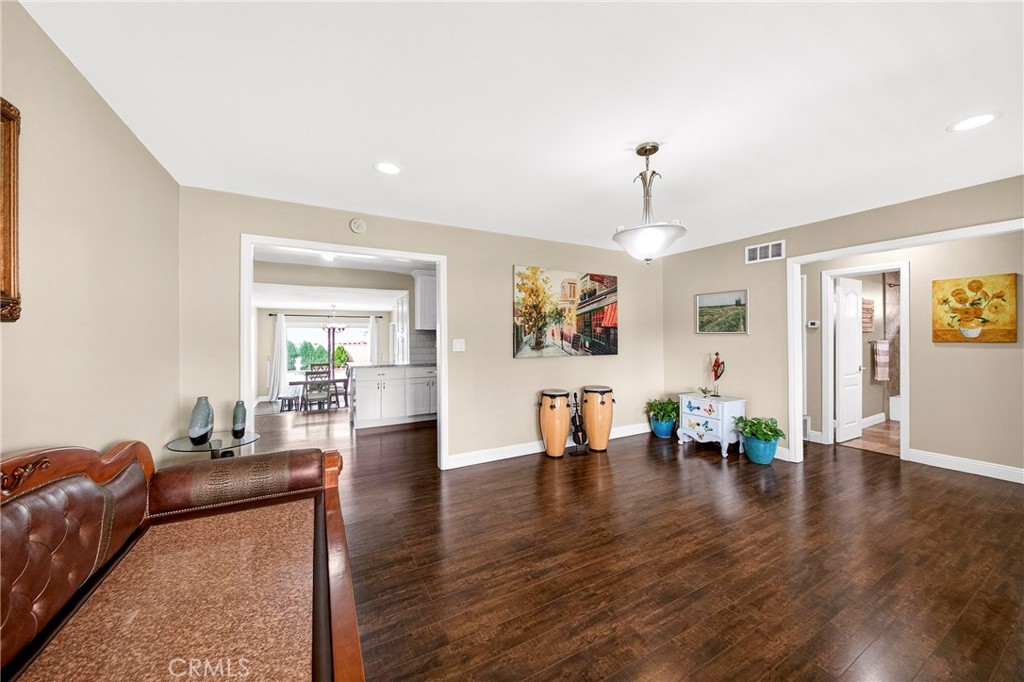 15243 Crosswood Road La Mirada, CA 90638 - Photo 8 of 44 a living room with furniture and wooden floor