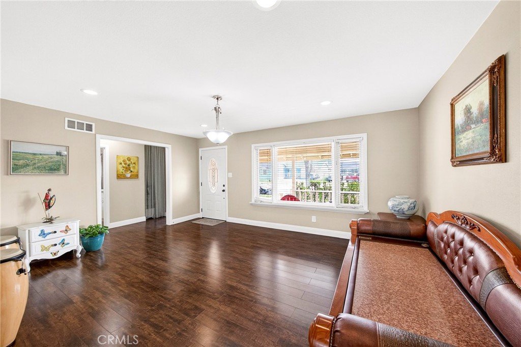 15243 Crosswood Road La Mirada, CA 90638 - Photo 9 of 44 a living room with furniture and wooden floor