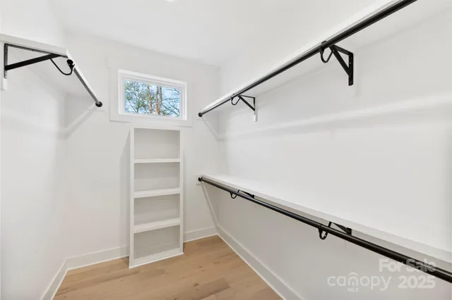a view of a hallway with closet
