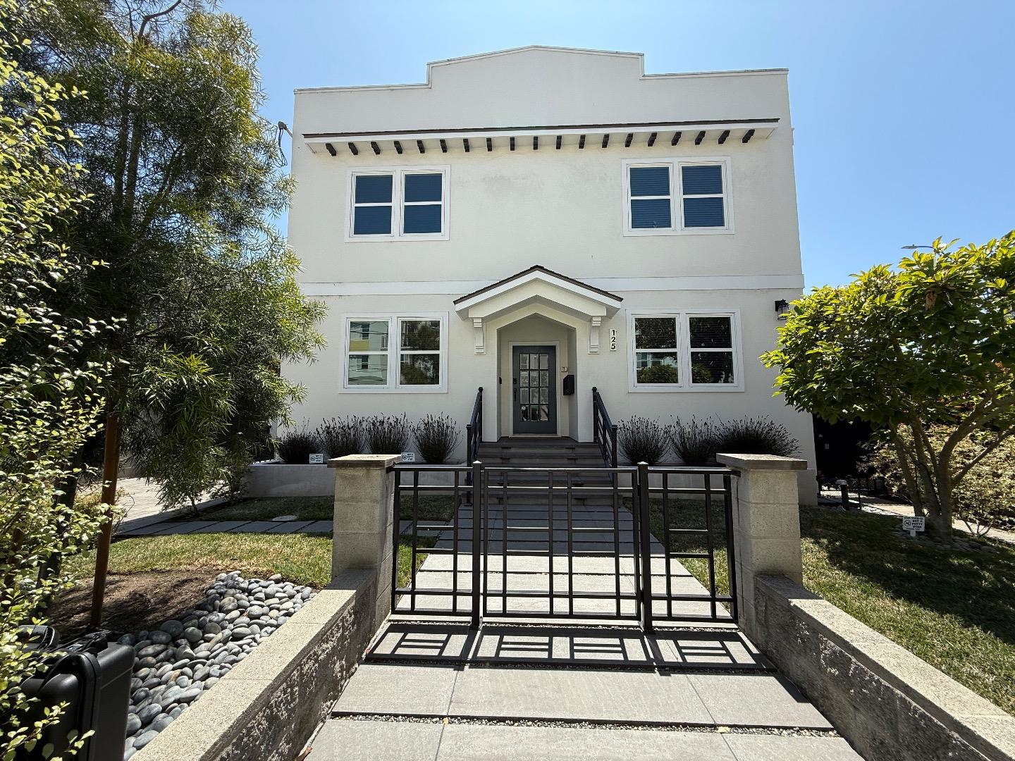 125 Park Road, Unit B Burlingame, CA 94010 - Photo 1 of 13 a front view of a house with garden