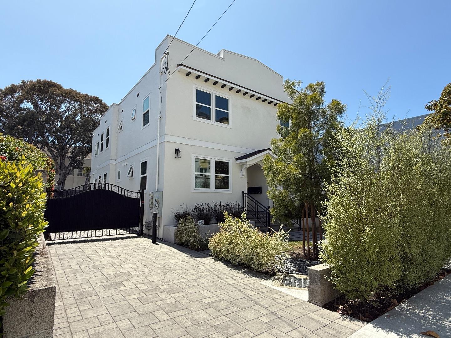 125 Park Road, Unit B Burlingame, CA 94010 - Photo 2 of 13 a front view of a house with a yard