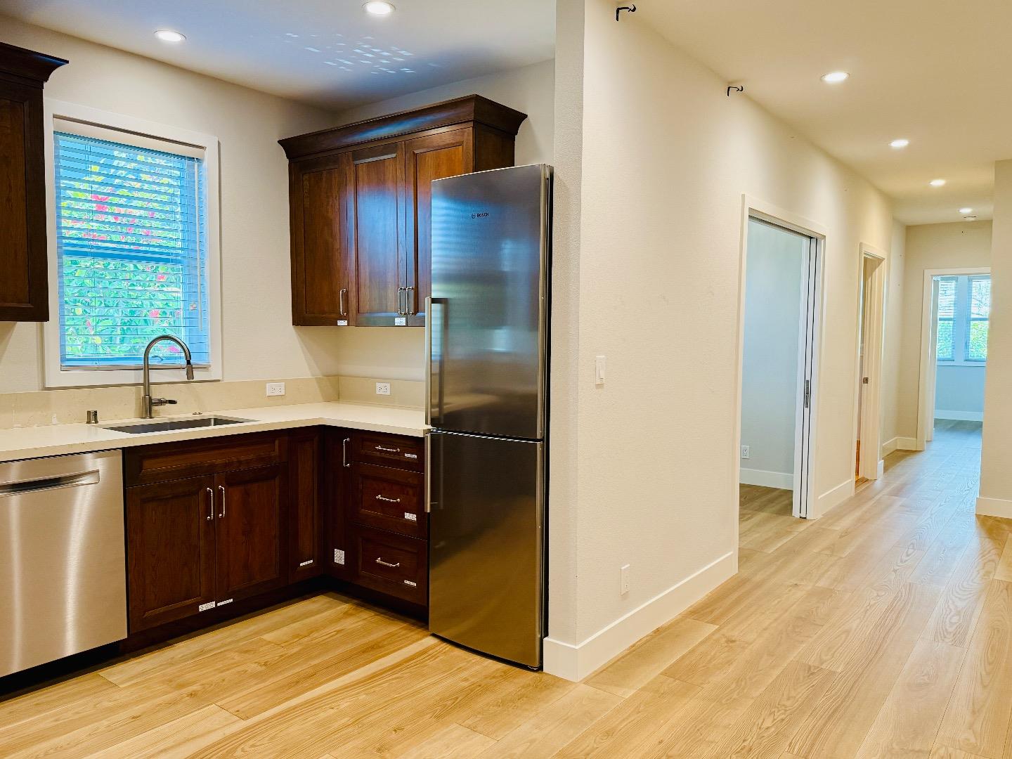 125 Park Road, Unit B Burlingame, CA 94010 - Photo 6 of 13 a bathroom with a sink and a mirror