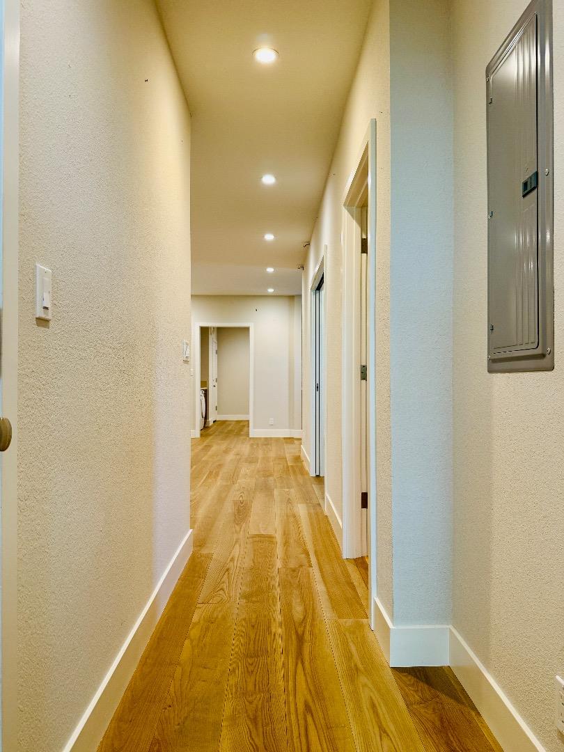 125 Park Road, Unit B Burlingame, CA 94010 - Photo 7 of 13 a view of hallway with wooden floor