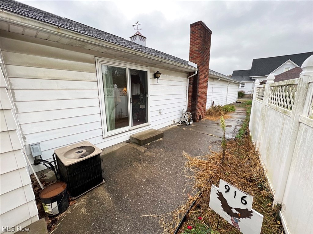 918 Amherst Road Northeast Massillon, OH 44646 - Photo 4 of 31 View of terrace with central air condition unit